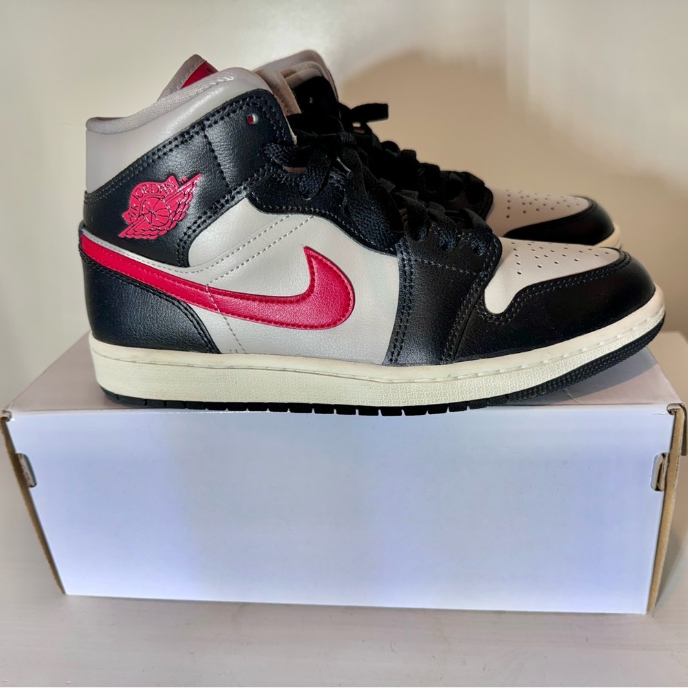 Woman’s Air Jordan 1 mid. Used only once in excellent condition